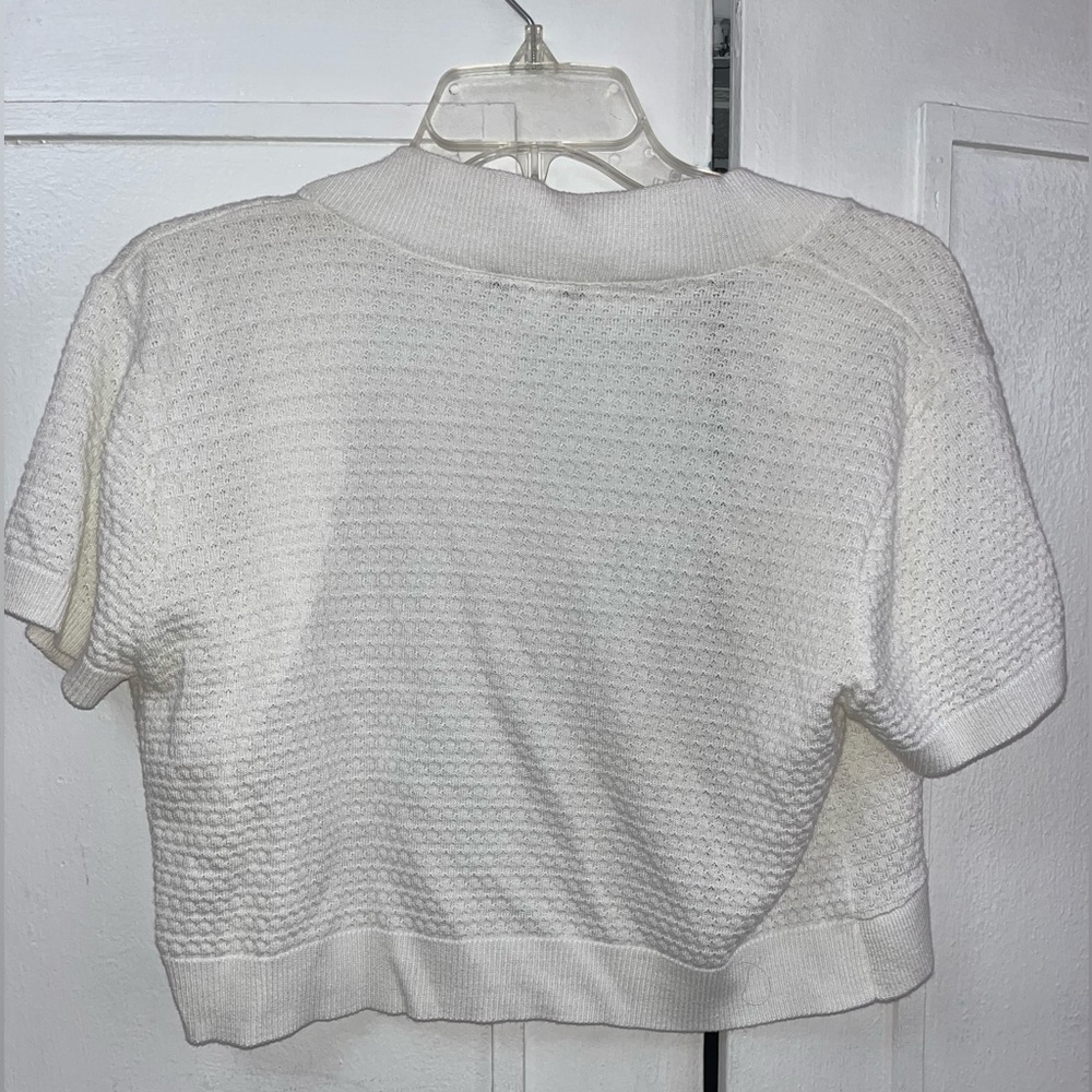 Super cute short sleeve cardigan. Mesh.